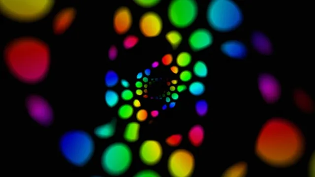 Colorful Glowing Particles Flowing on Black Background