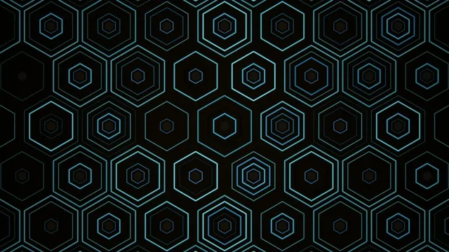 Hexagonal patterns create a repeated design on a black surface