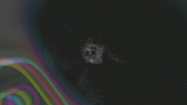 Loop VJ tunnel neon astratto con spirale arcobaleno vibrante, sfondo scuro e motivi geometrici di luce brillante