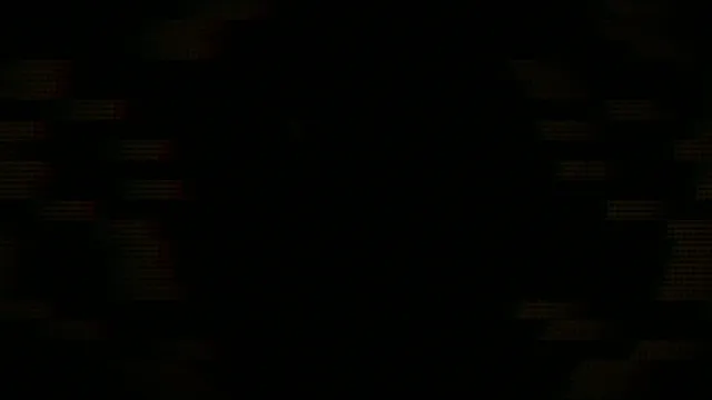 People gather at a street market in the evening for food and shopping