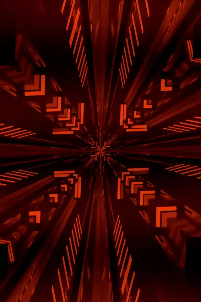 Czerwono-pomarańczowy neonowy tunel fraktalny z symetrycznymi wzorami geometrycznymi promieniującymi ze środka, tworzącymi wirujący efekt kalejdoskopu. Abstrakcyjna pętla VJ.