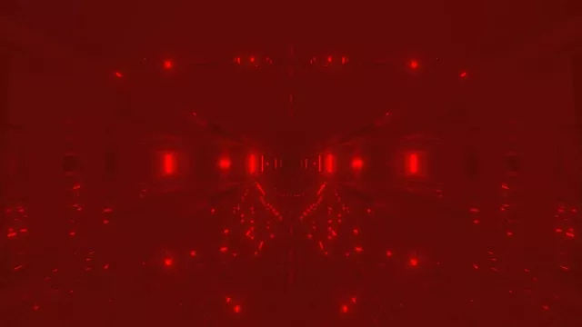 闇へ消える光を持つ深紅色のネオンテュネル、抽象的なVJループモーション背景